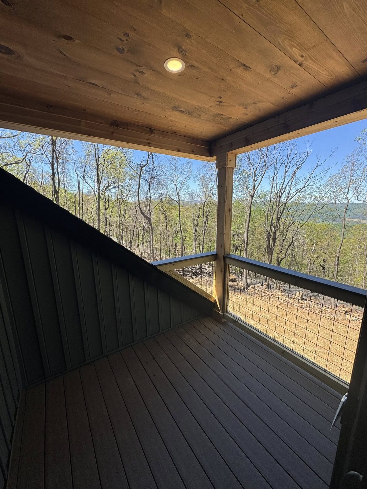 Covered porch with composite decking and recessed lighting built by Home Fix Pro in Purcellville VA