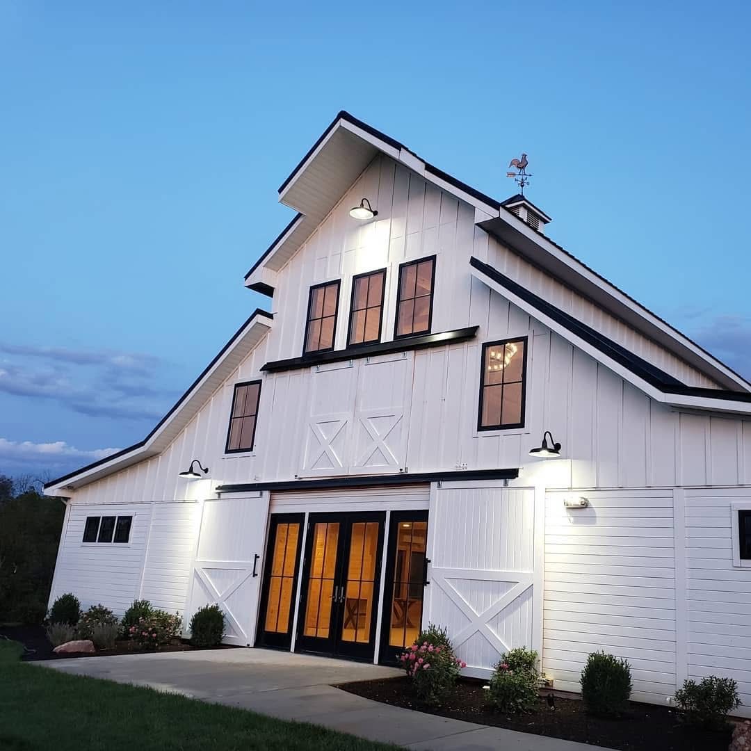 Board and batten siding, new windows and French doors on a custom build by Home Fix Pro in Purcellville VA